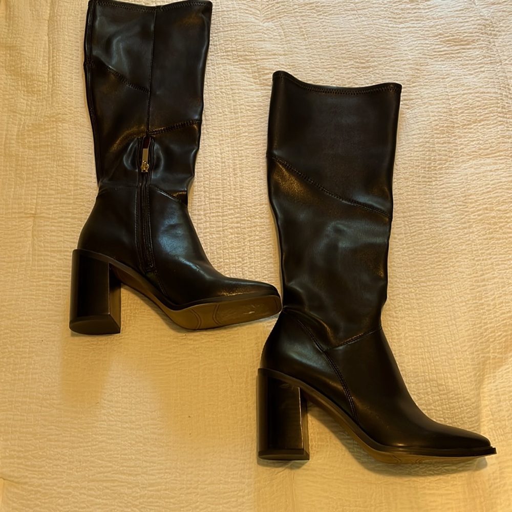 Tall black boots with heel